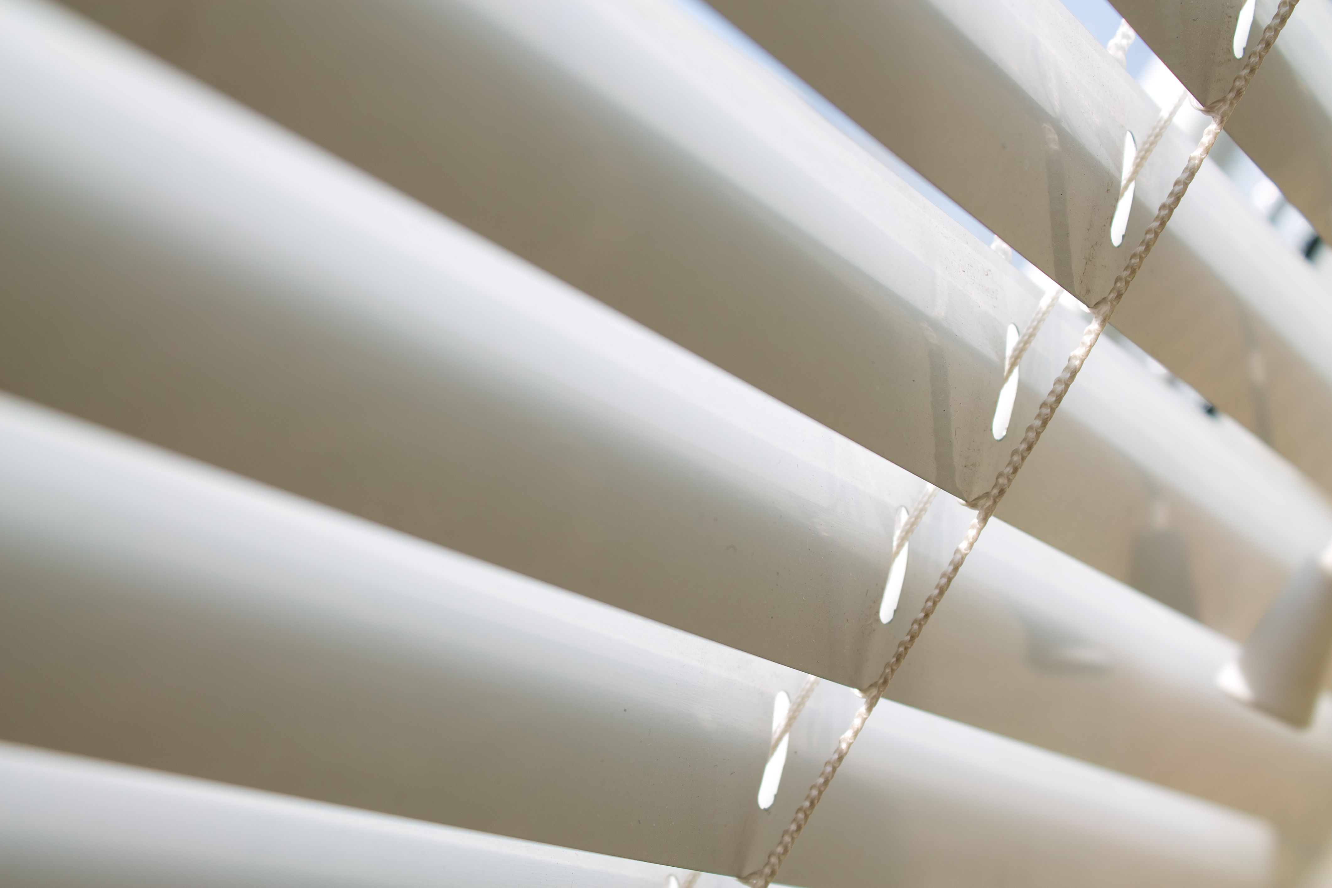 Close-up of freshly cleaned white blinds